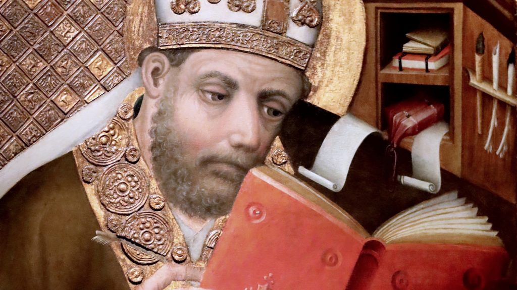 St Ambrose reading a book without moving his lips